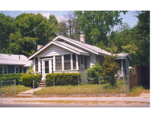 1368 Bay Street Springfield, MA 01109 - Photo 1 of 1 a front view of a house with a yard