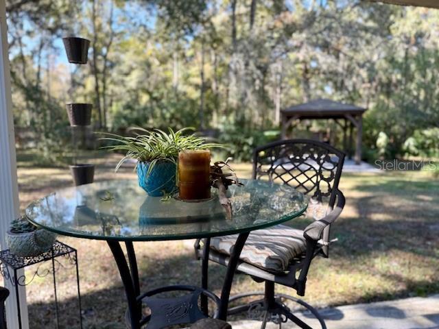5043 Goodwin Road Brooksville, FL 34601 - Photo 8 of 47 a view of an outdoor sitting space