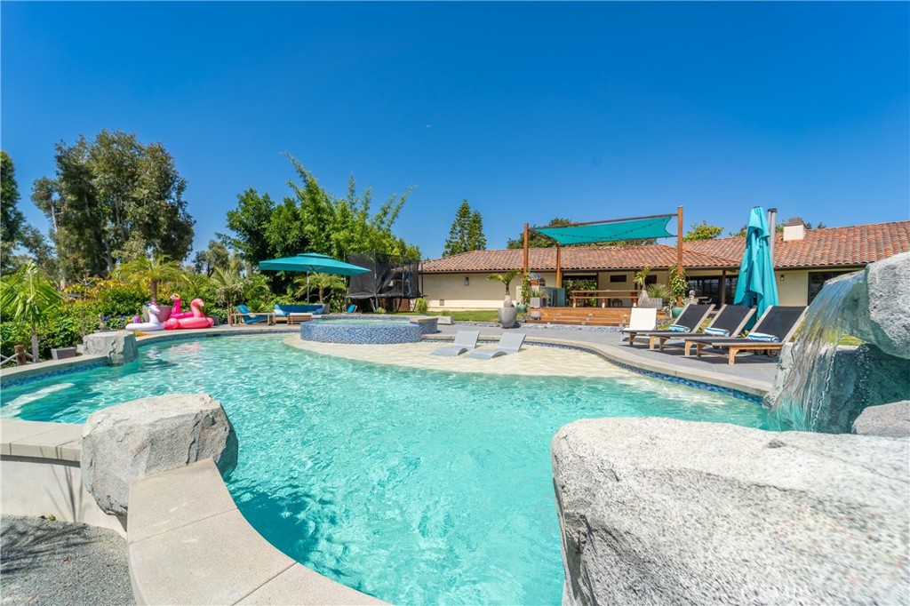 7337 La Soldadera Rancho Santa Fe, CA 92067 - Photo 44 of 60 a view of a backyard with plants and patio