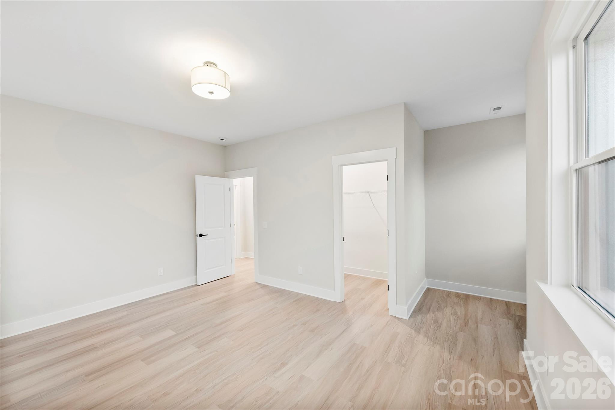 551 Perry Road Troutman, NC 28166 - Photo 28 of 47 wooden floor in an empty room