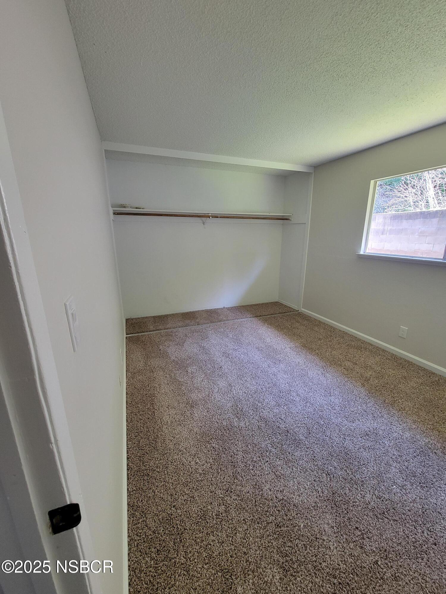 1328 West Willow Avenue Lompoc, CA 93436 - Photo 14 of 22 an empty room with windows