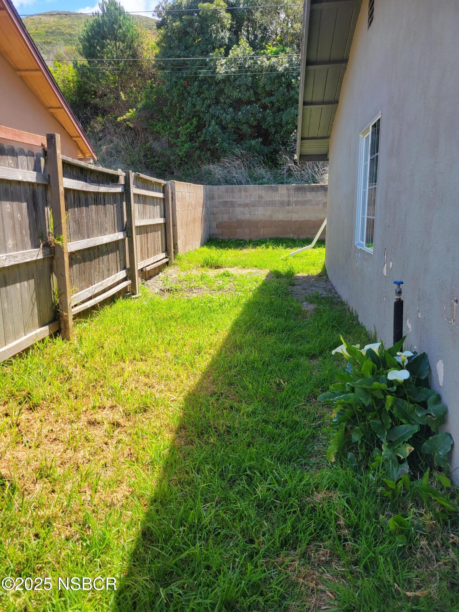 1328 West Willow Avenue Lompoc, CA 93436 - Photo 20 of 22 a view of a swimming pool with an outdoor seating
