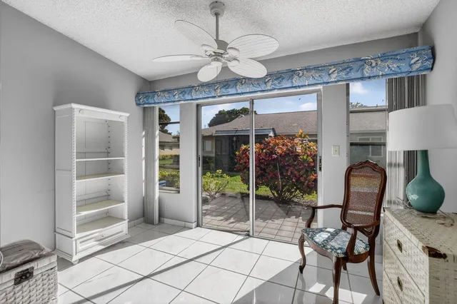 a view of a livingroom with furniture and entryway