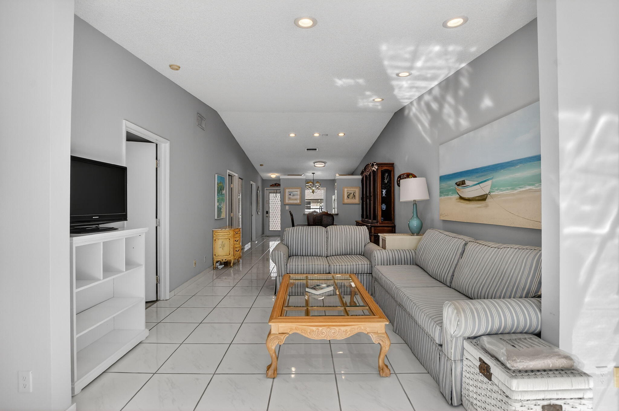 8622 Dreamside Lane Boca Raton, FL 33496 - Photo 15 of 36 a living room with furniture and a flat screen tv