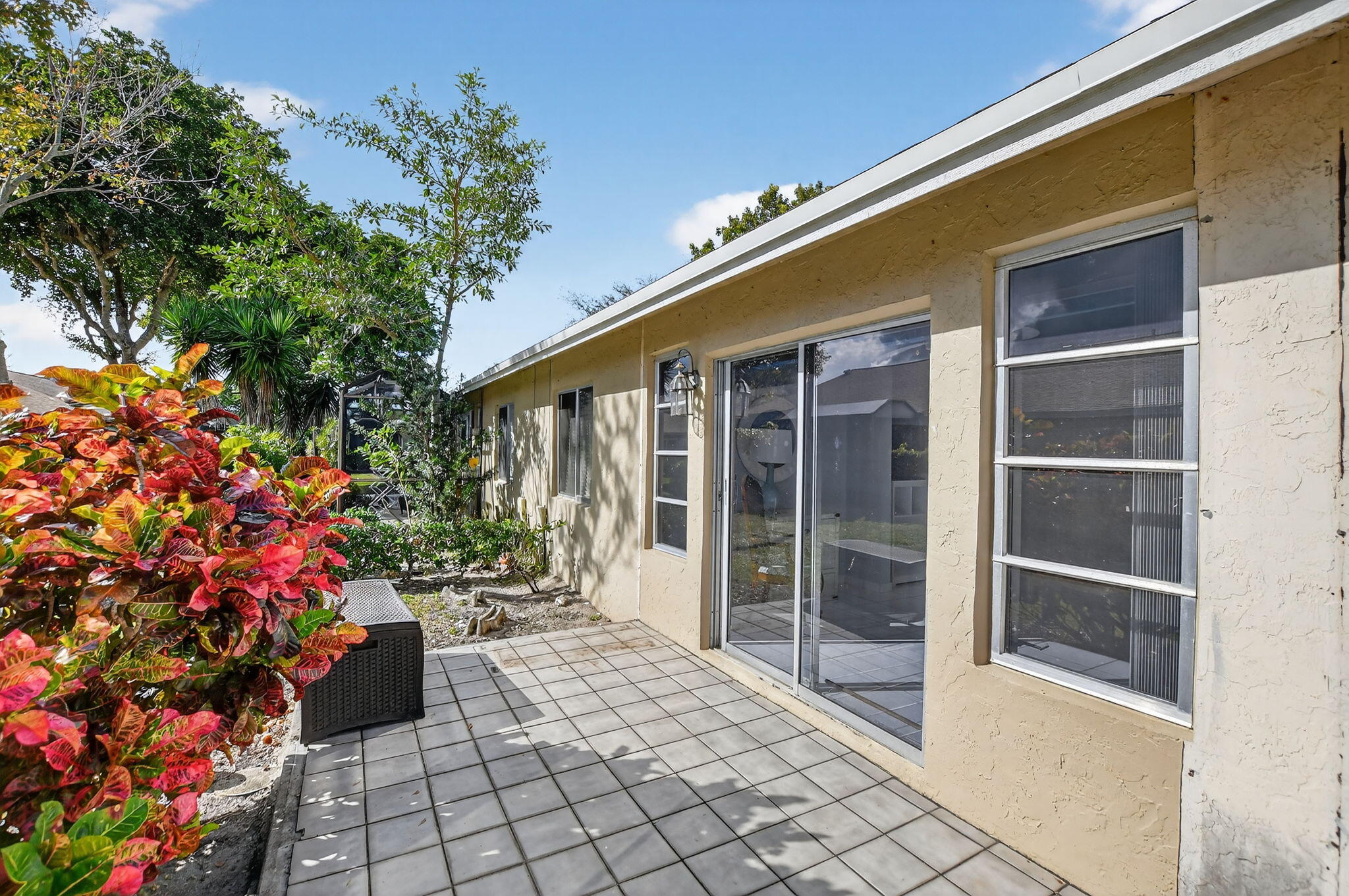8622 Dreamside Lane Boca Raton, FL 33496 - Photo 26 of 36 a balcony with furniture and flowers