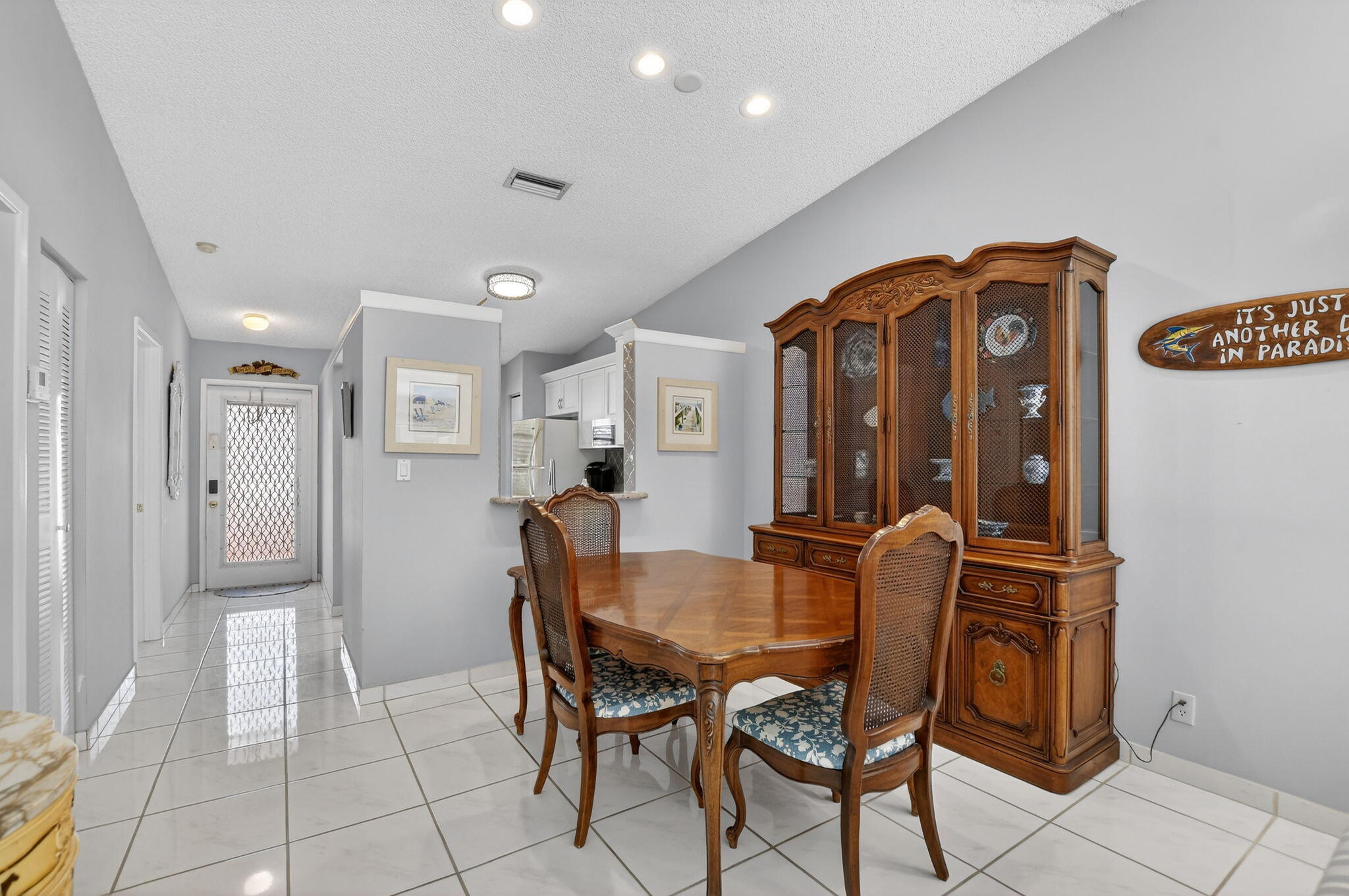 8622 Dreamside Lane Boca Raton, FL 33496 - Photo 8 of 36 a dining room with furniture and window