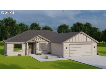 227 Southwest Goldfinch Lane Boardman, OR 97818 - Photo 2 of 28 a house view with a garden space