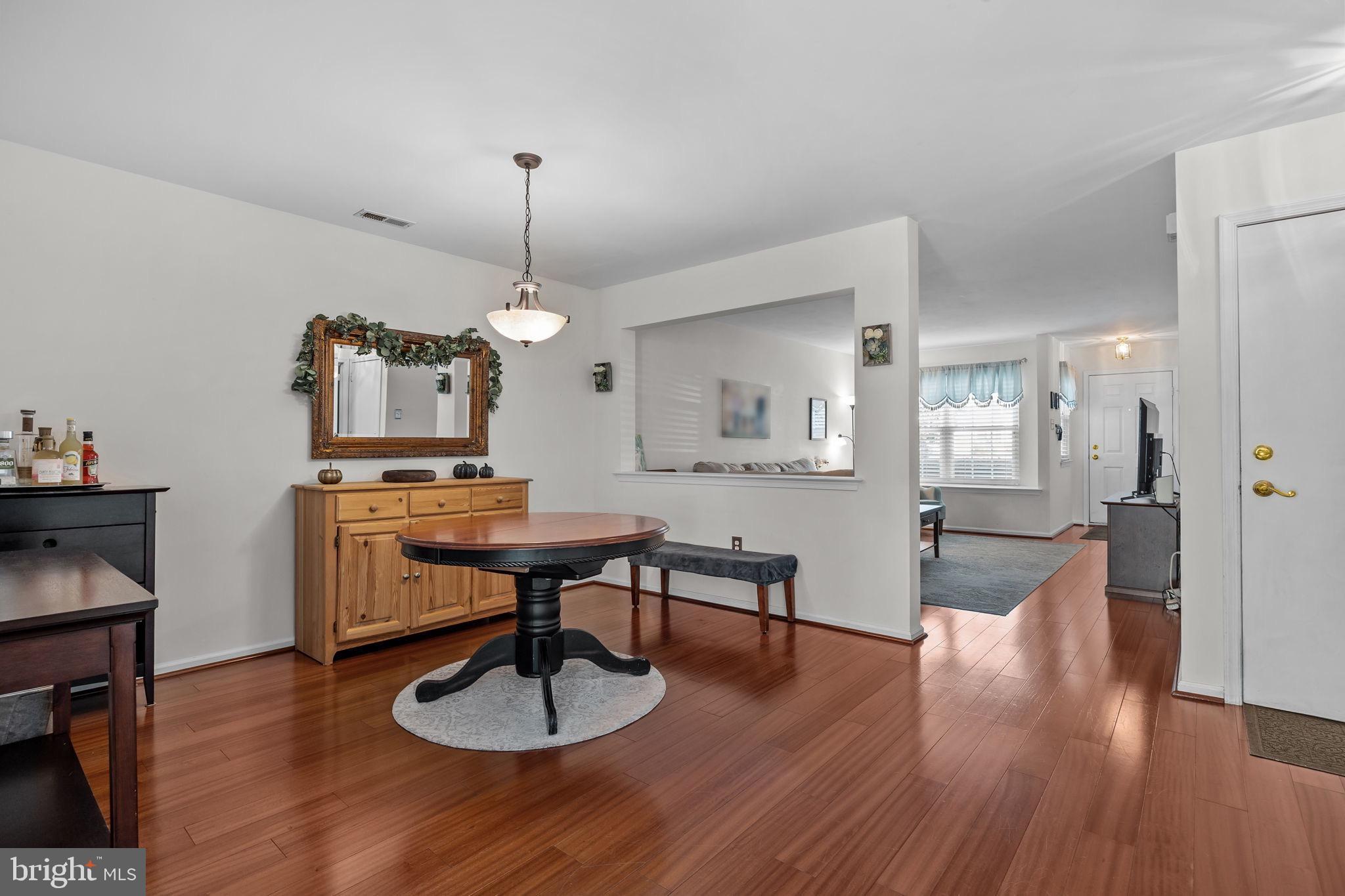 102 Broadleaf Place Newtown, PA 18940 - Photo 11 of 47 a living room with furniture and a wooden floor