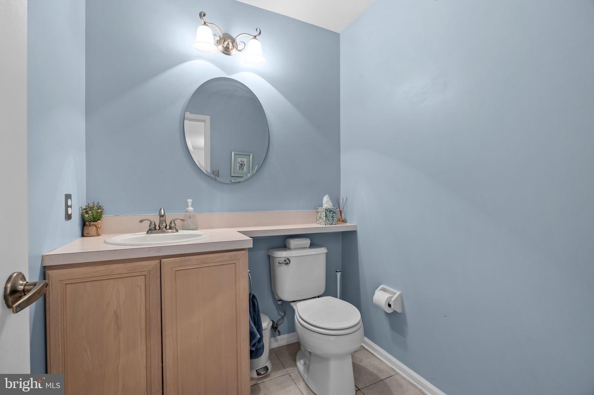 102 Broadleaf Place Newtown, PA 18940 - Photo 12 of 47 a bathroom with a toilet a sink and mirror