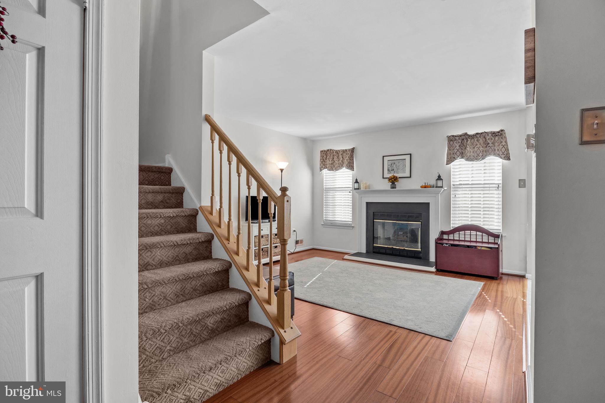 102 Broadleaf Place Newtown, PA 18940 - Photo 13 of 47 a living room with furniture and a fireplace