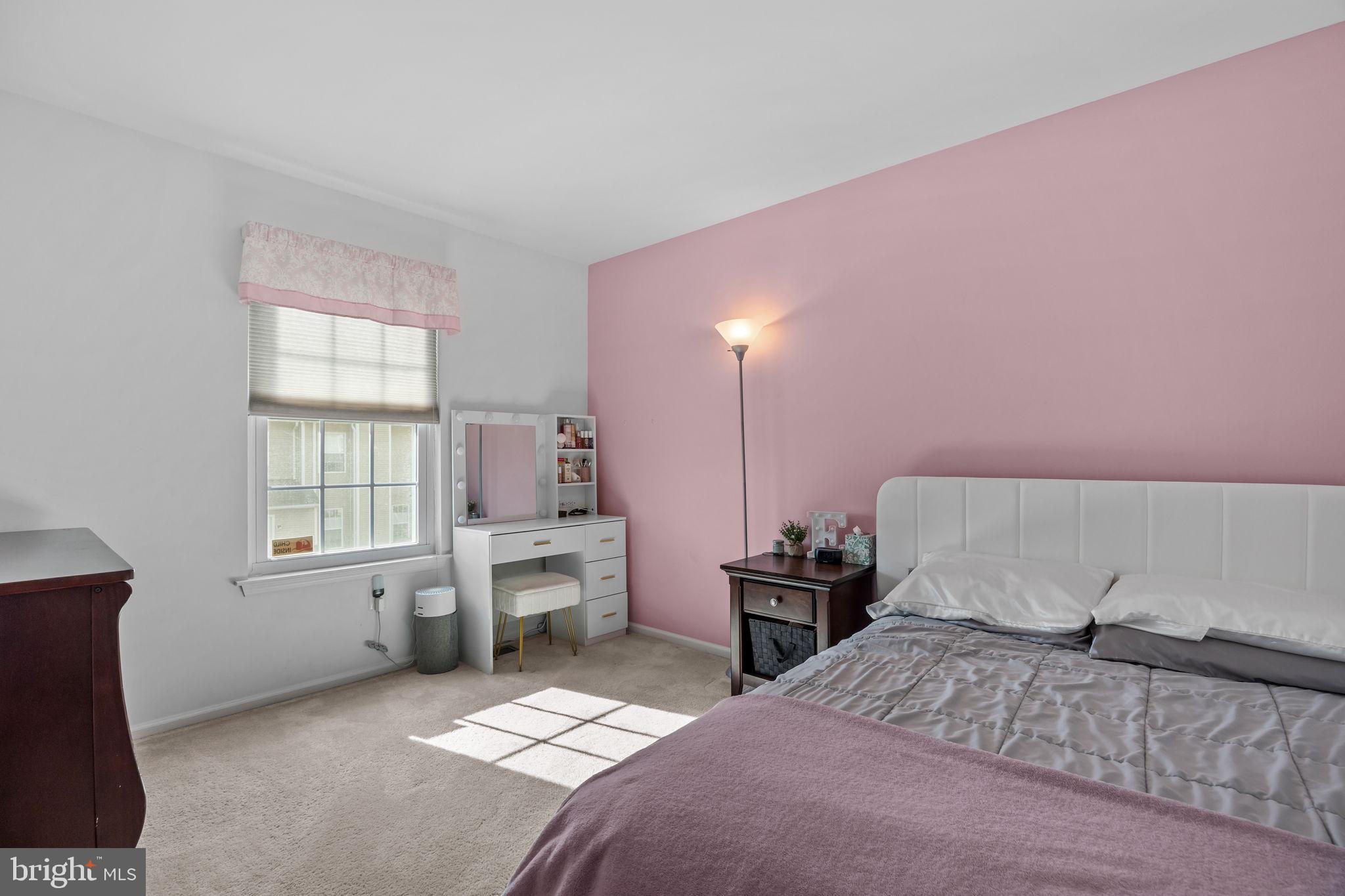 102 Broadleaf Place Newtown, PA 18940 - Photo 23 of 47 a bedroom with a bed and wooden floor