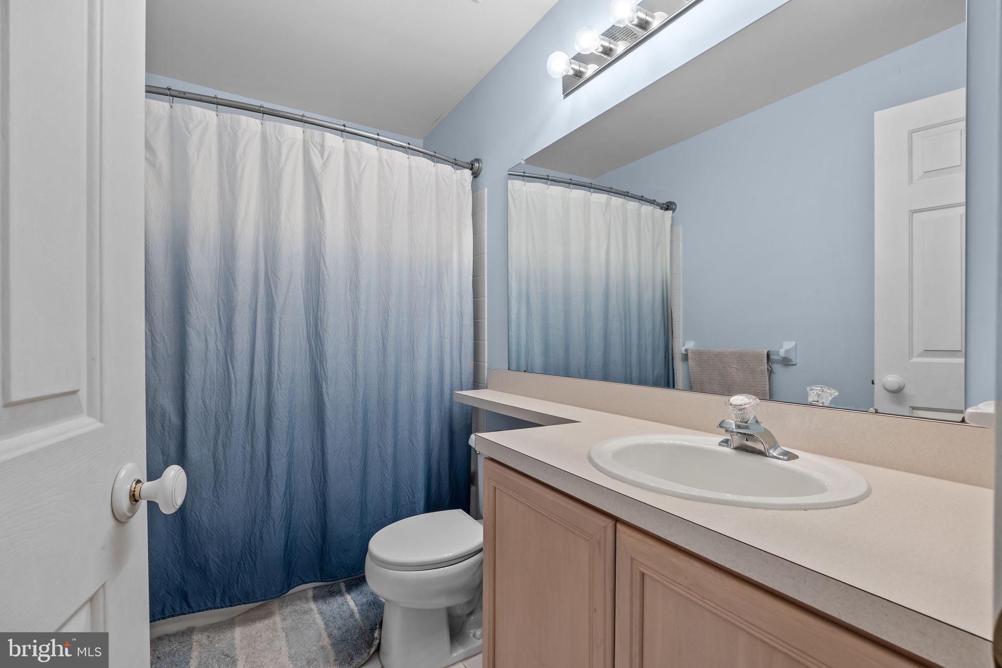 102 Broadleaf Place Newtown, PA 18940 - Photo 24 of 47 a bathroom with a sink a toilet and shower