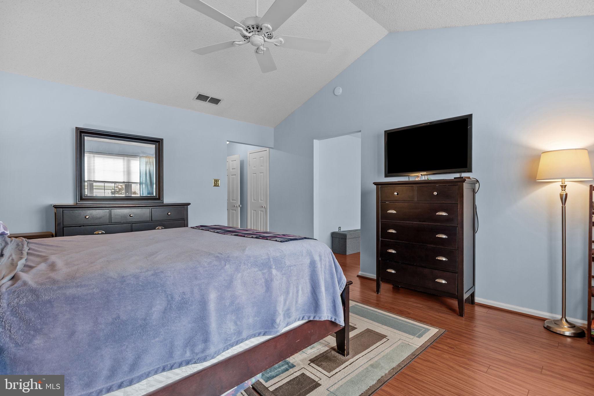 102 Broadleaf Place Newtown, PA 18940 - Photo 28 of 47 a bedroom with a bed and a flat screen tv
