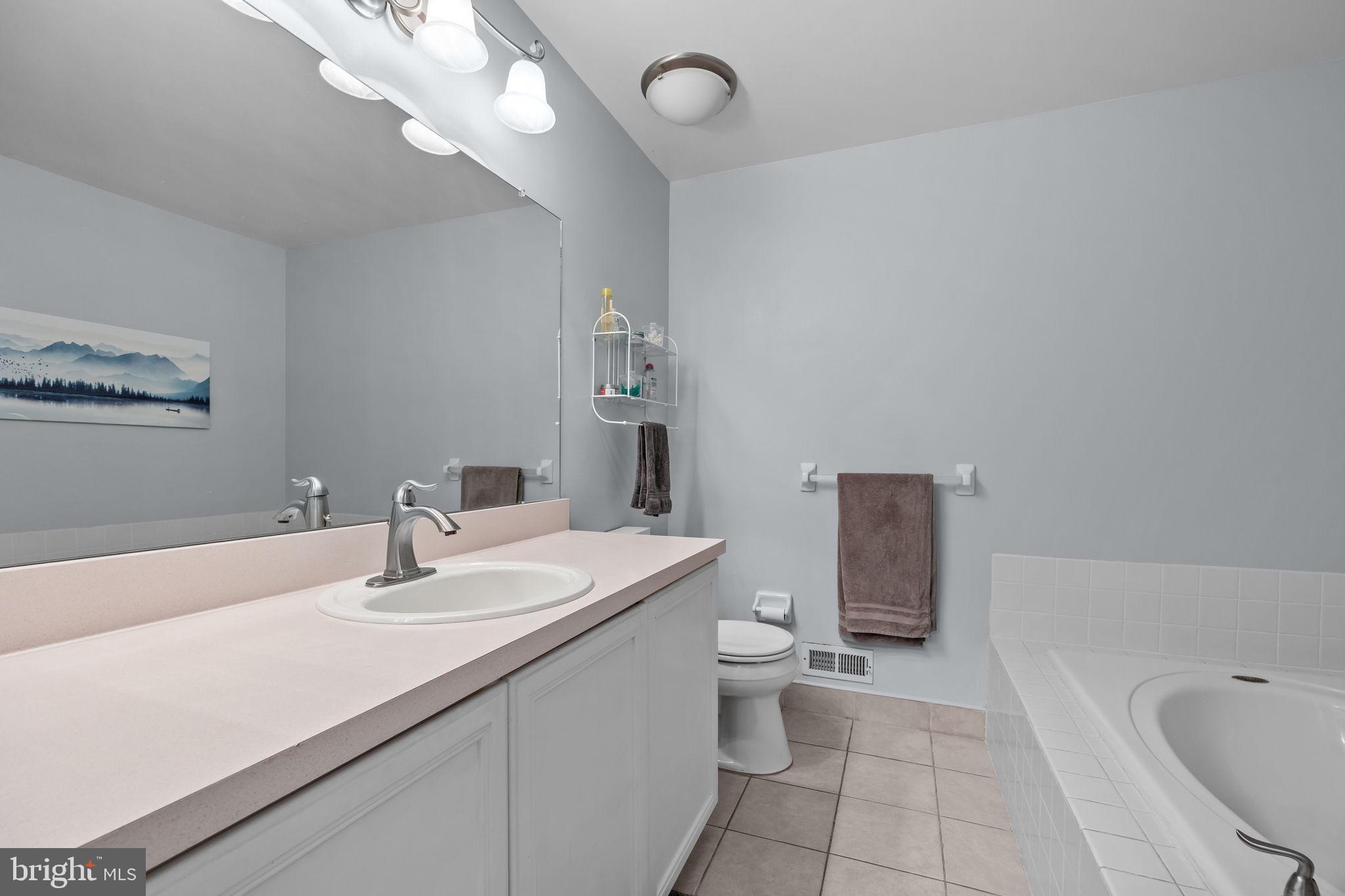 102 Broadleaf Place Newtown, PA 18940 - Photo 30 of 47 a bathroom with a sink a toilet and bathtub