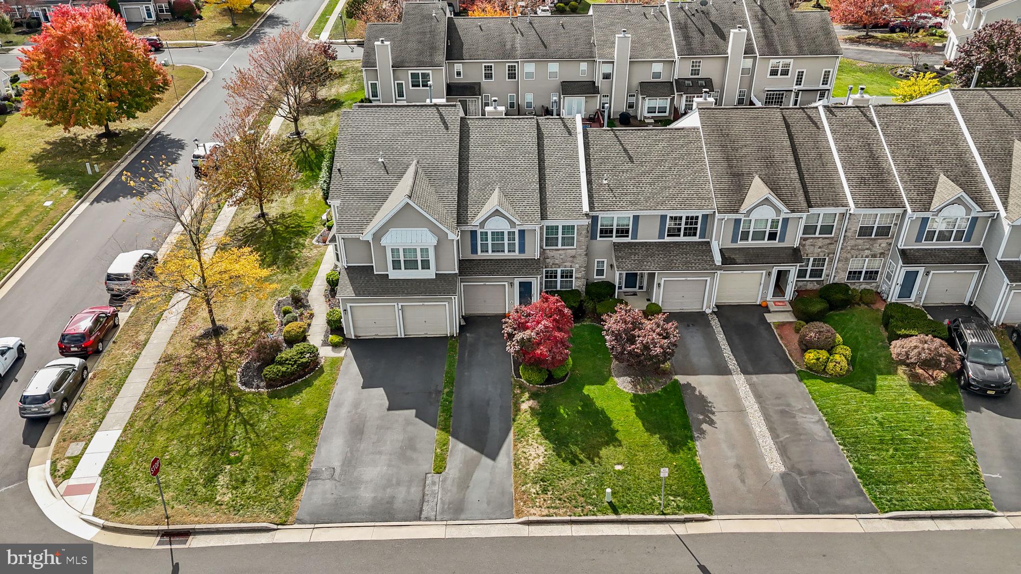 102 Broadleaf Place Newtown, PA 18940 - Photo 43 of 47 an aerial view of a house with a garden and plants