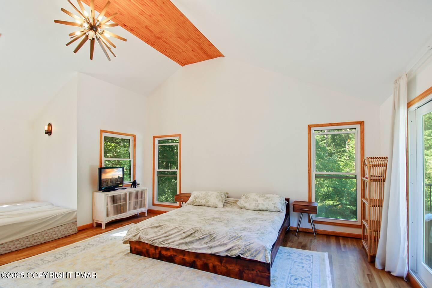 117 Bollinger Road Kunkletown, PA 18058 - Photo 20 of 25 a bedroom with a bed and wooden floor
