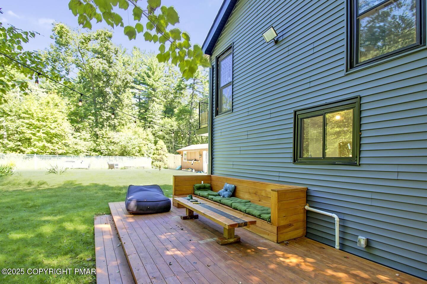 117 Bollinger Road Kunkletown, PA 18058 - Photo 4 of 25 a backyard of a house with table and chairs