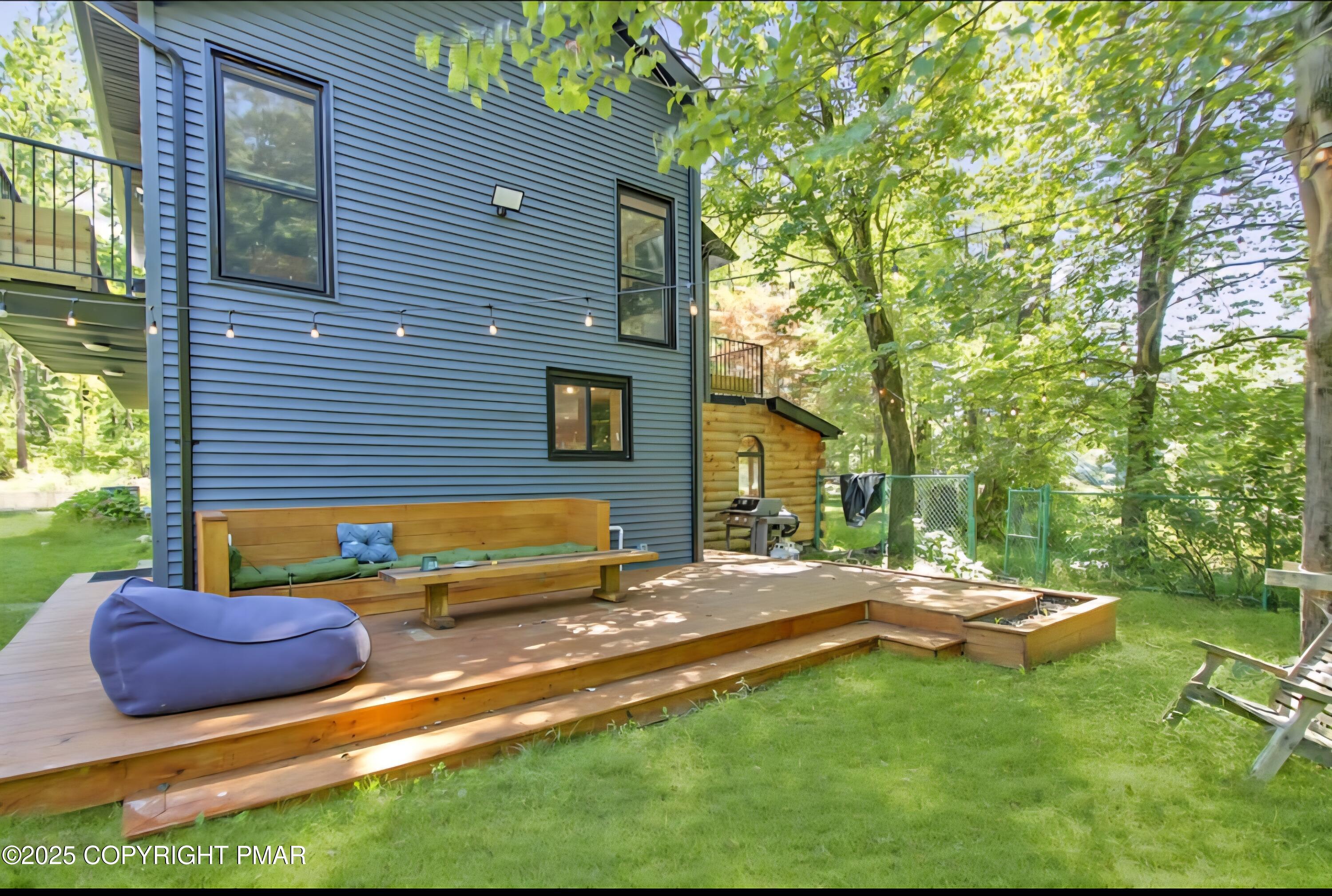 117 Bollinger Road Kunkletown, PA 18058 - Photo 5 of 25 a backyard of a house with table and chairs