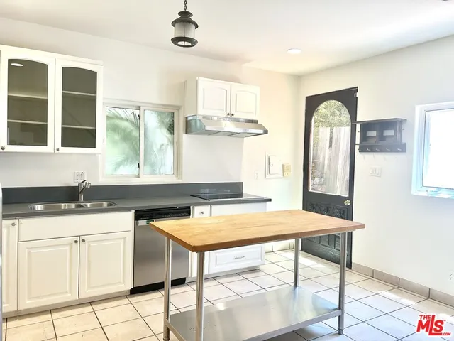 a bathroom with a shower and a toilet