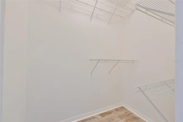 a view of a room with racks on the wall