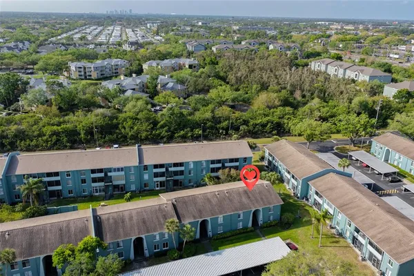 an aerial view of a house with a garden