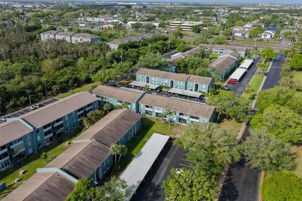 an aerial view of a house with a garden