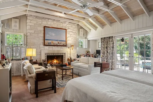 a view of a livingroom with furniture and a fireplace