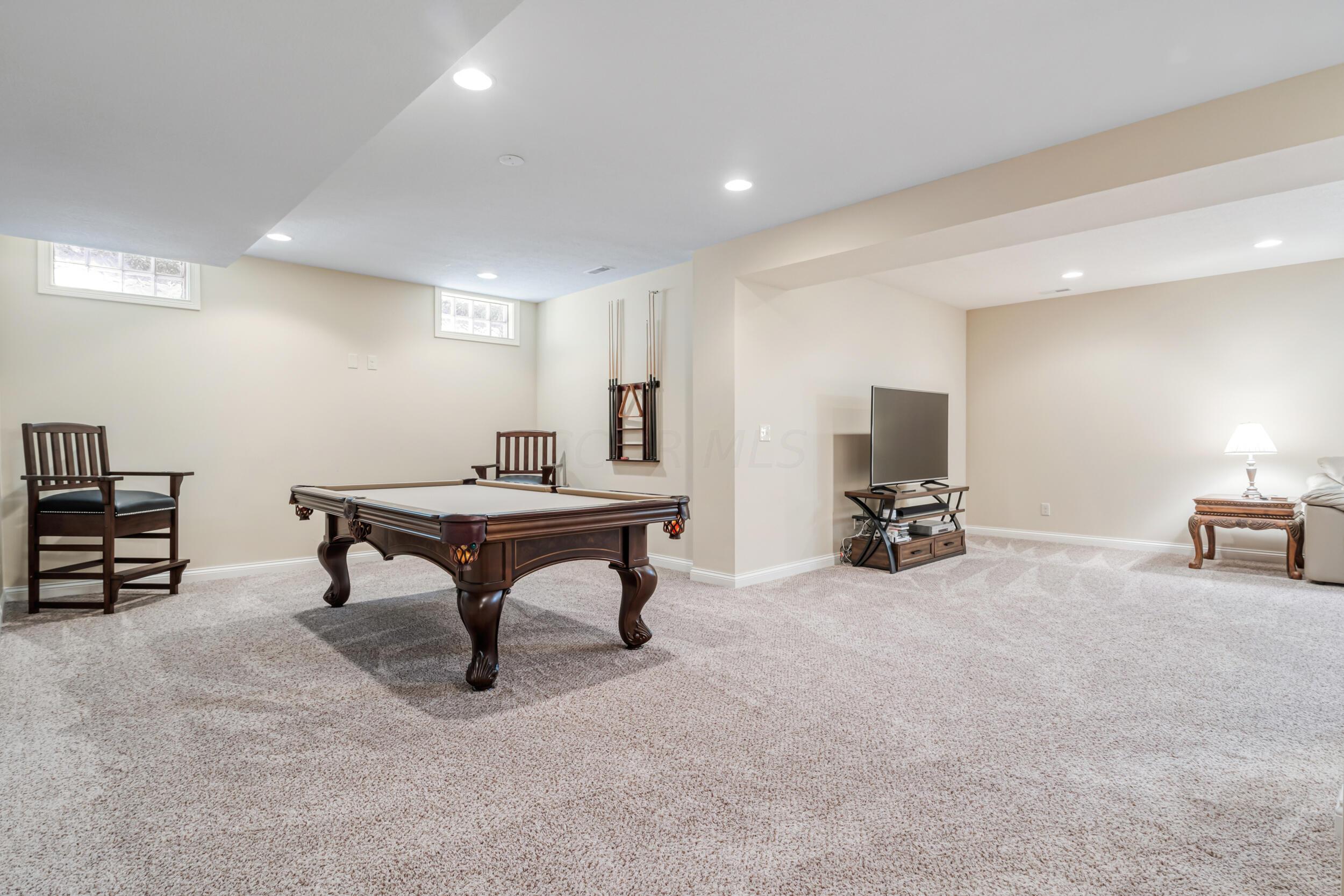 6731 Winemack Loop Dublin, OH 43016 - Photo 29 of 42 Lower Level Family Room / Rec Room
