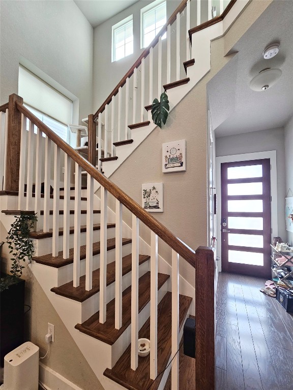 7511 Wildcat Pass Austin, TX 78757 - Photo 5 of 24 a view of entryway with wooden floor and stairs