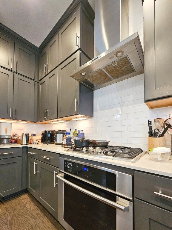 7511 Wildcat Pass Austin, TX 78757 - Photo 10 of 24 a kitchen with stainless steel appliances a sink dishwasher stove and refrigerator