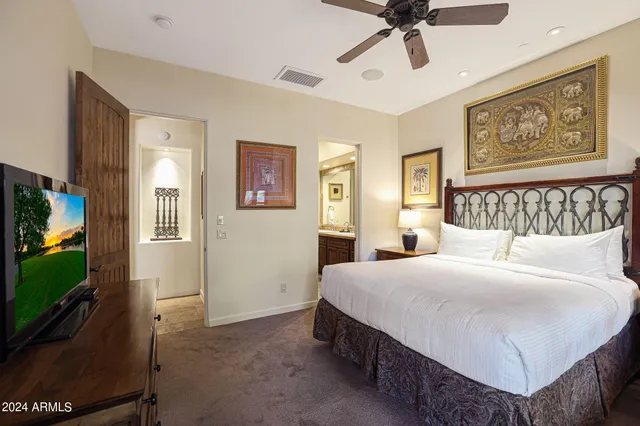 a bathroom with sink granite and a mirror