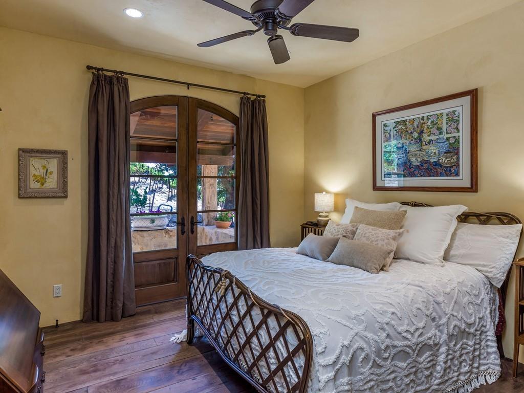 2900 Soma Way Gilroy, CA 95020 - Photo 25 of 61 a bedroom with a large bed and a chandelier