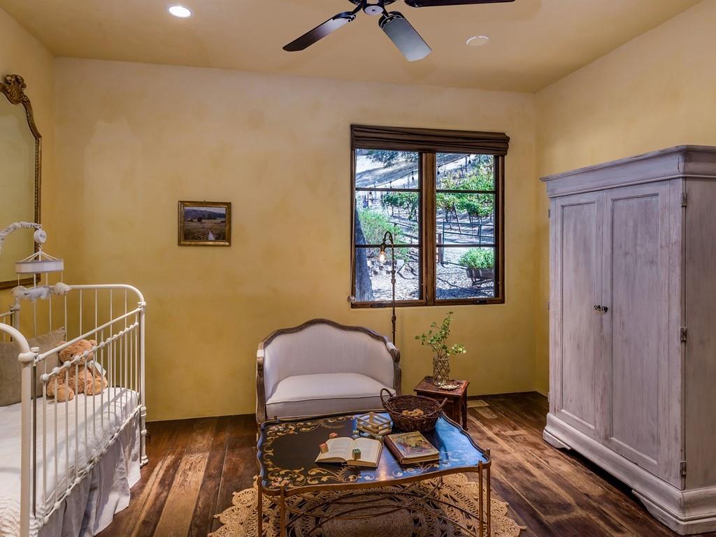 2900 Soma Way Gilroy, CA 95020 - Photo 29 of 61 a bedroom with a bed and wooden floor