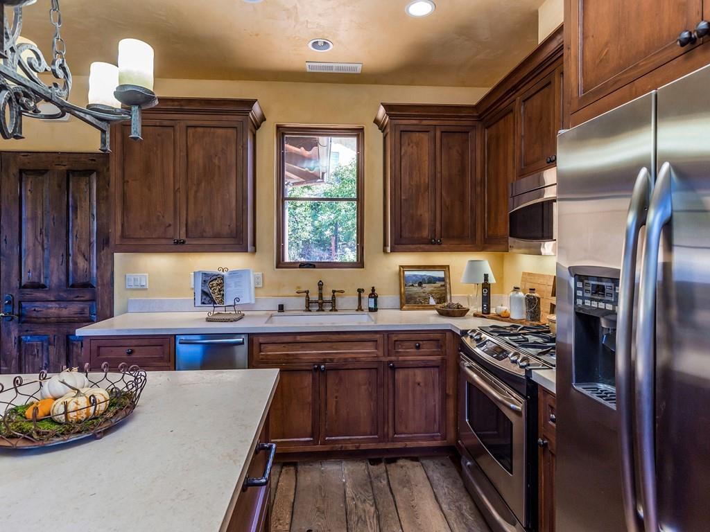 2900 Soma Way Gilroy, CA 95020 - Photo 54 of 61 a kitchen with stainless steel appliances a stove a refrigerator and a sink