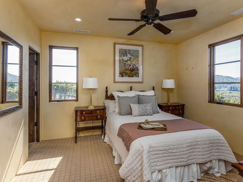 2900 Soma Way Gilroy, CA 95020 - Photo 55 of 61 a bedroom with a bed a couch and a window