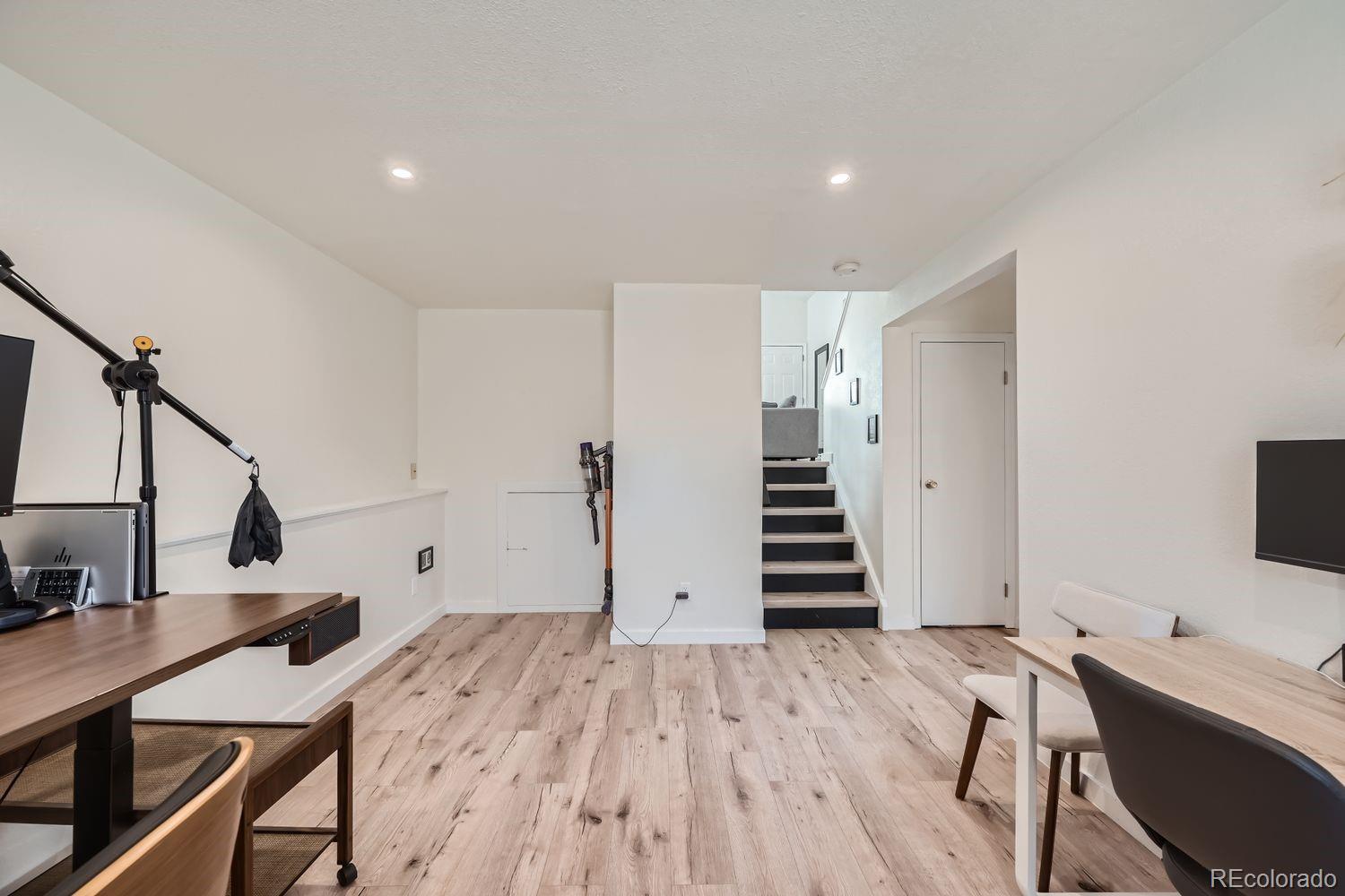 4600 Dillon Street Denver, CO 80239 - Photo 18 of 27 a view of a room with gym equipment