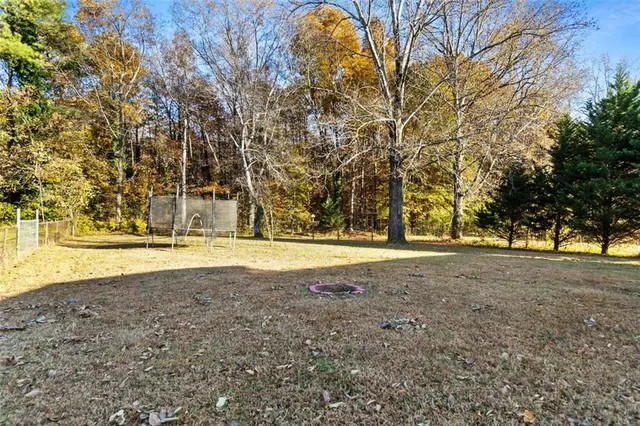 a view of swimming pool with trees