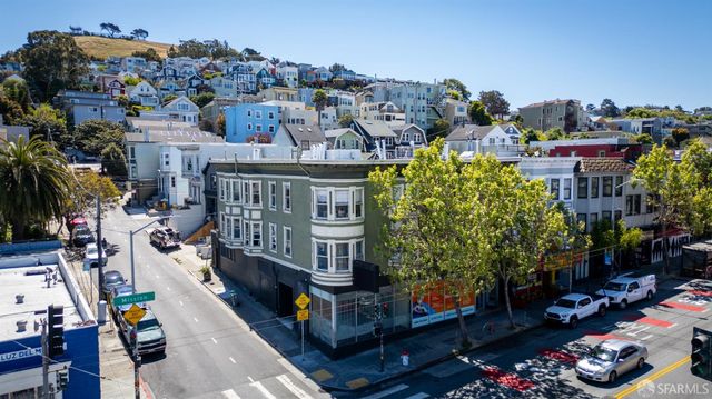 a front view of a house with parking