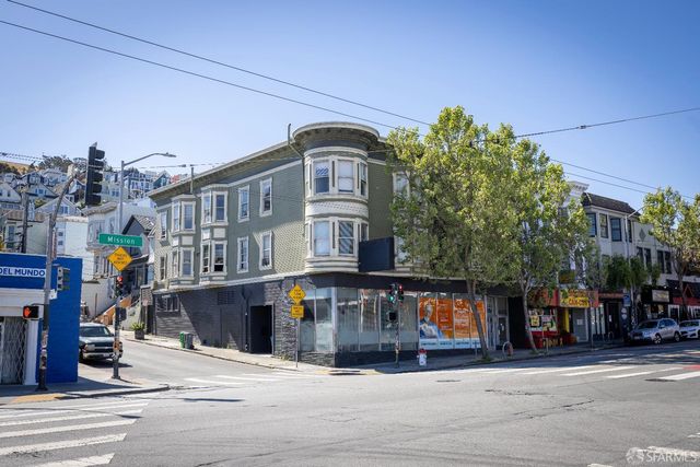 a front view of a house with a garage