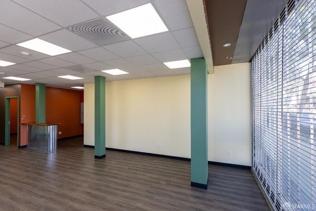 a front view of a building with street view