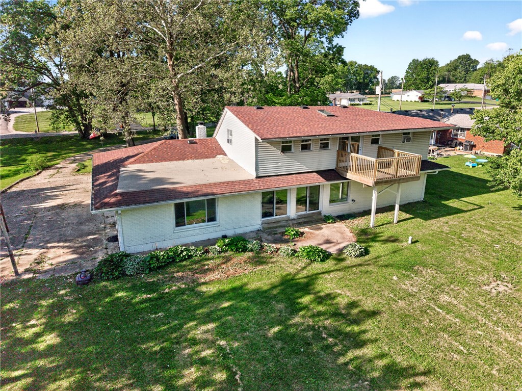 2684 Arthur Road Springfield, OH 45502 - Photo 65 of 69 This charming residence features a spacious backyard and an inviting deck perfect for outdoor enjoyment.