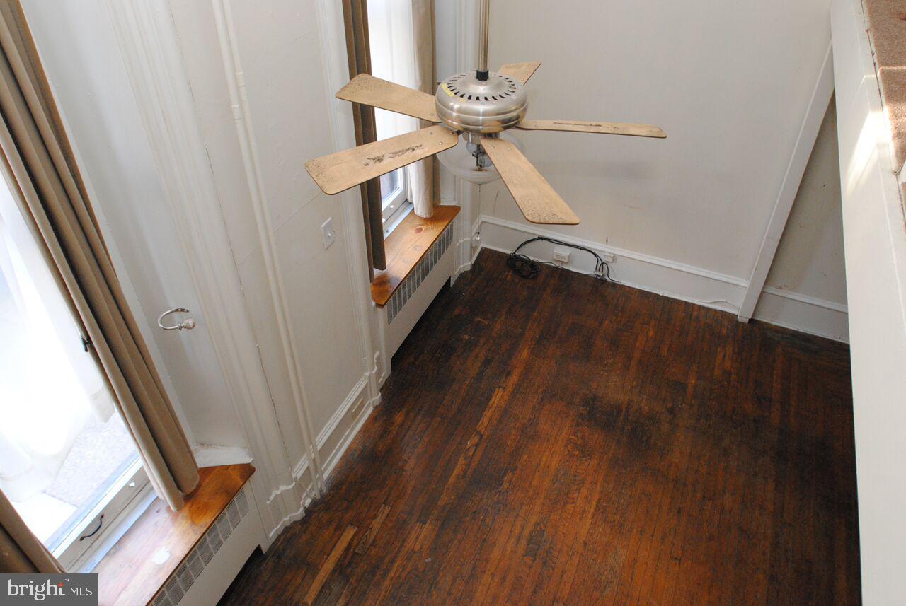 2008 Spruce Street, Unit 1F Philadelphia, PA 19103 - Photo 11 of 15 a view of an entryway with wooden floor