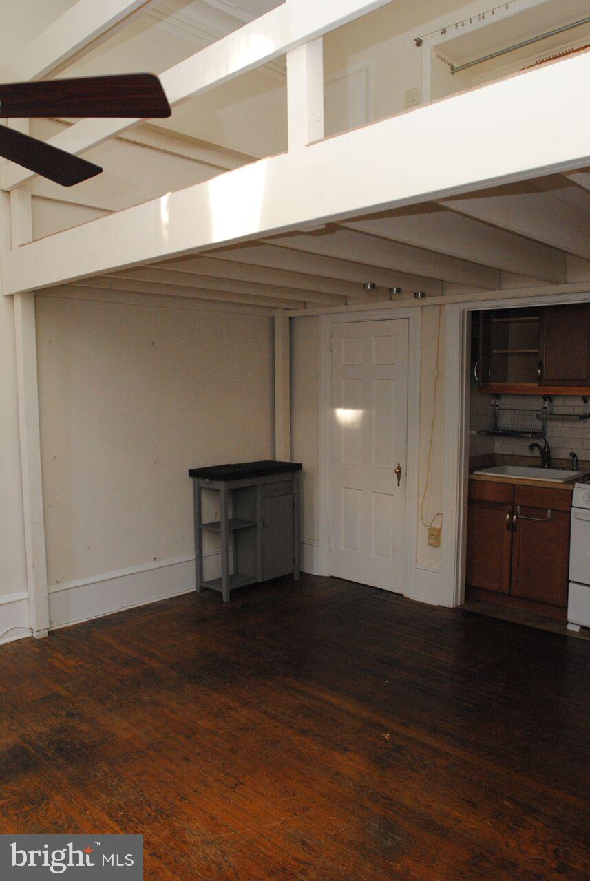 2008 Spruce Street, Unit 1F Philadelphia, PA 19103 - Photo 6 of 15 a view of a livingroom with wooden floor