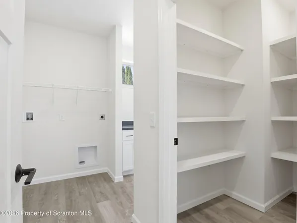 a view of an empty walk in closet