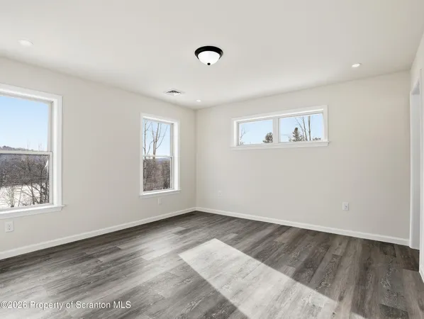 a view of livingroom with hardwood floor and window