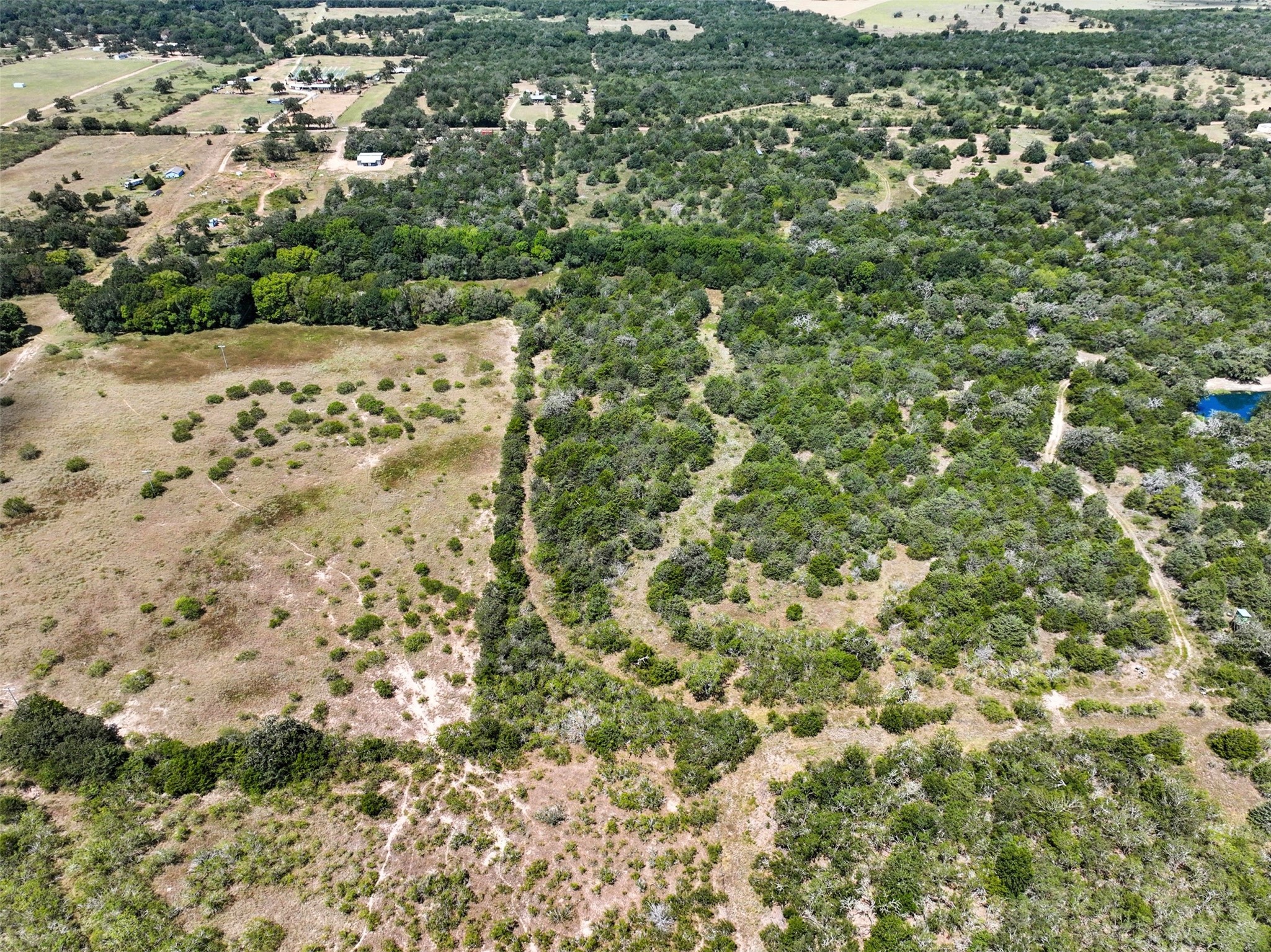 10667 Roy Road Flatonia, TX 78941 - Photo 16 of 16 an aerial view of a house with a yard