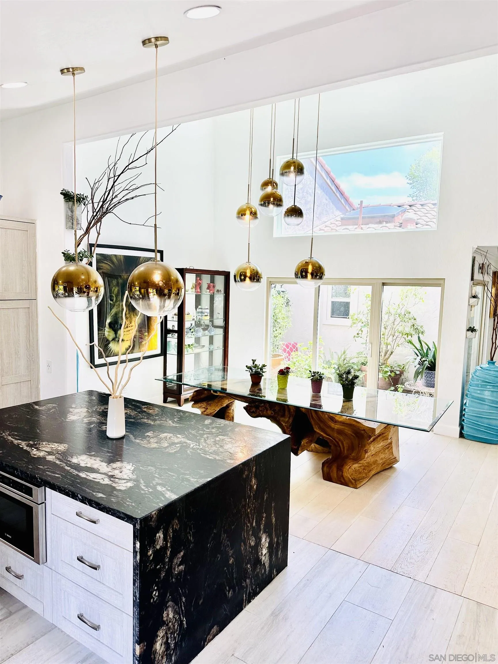 2310 Via Munera La Jolla, CA 92037 - Photo 3 of 50 a kitchen with a stove a sink and a refrigerator