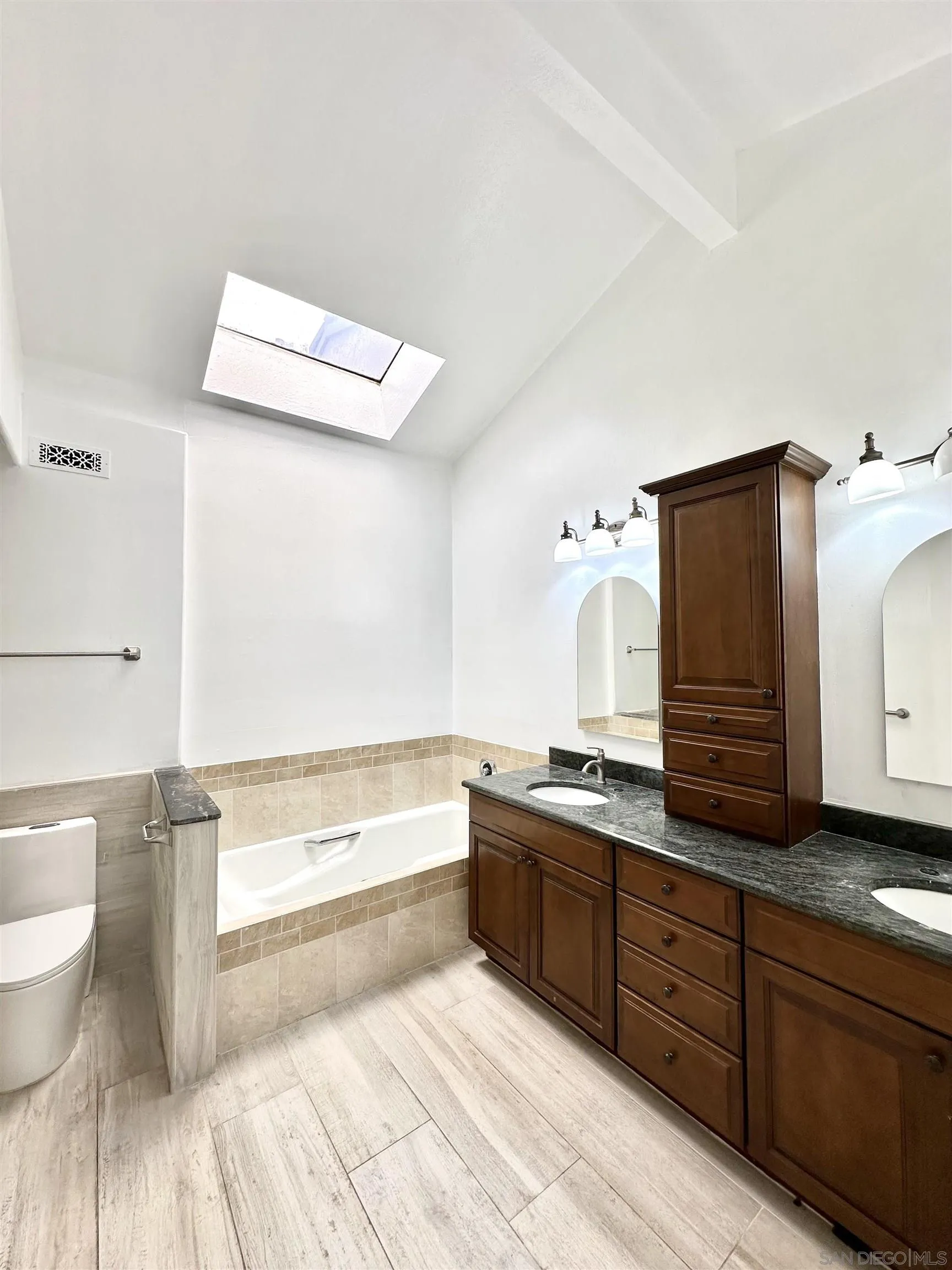 2310 Via Munera La Jolla, CA 92037 - Photo 33 of 50 a spacious bathroom with a tub sink and toilet