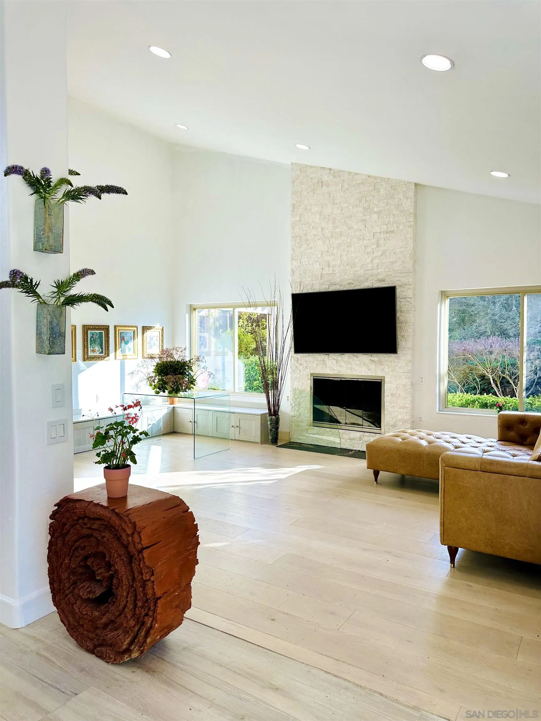 2310 Via Munera La Jolla, CA 92037 - Photo 6 of 50 a living room with furniture and a flat screen tv