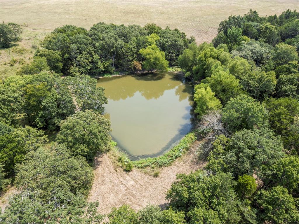 0 Cr-339 Terrell, TX 75161 - Photo 15 of 24 an aerial view of a house with a yard and lake view